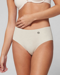 Model wearing Monkey730 ivory seamless brief underwear, front view